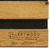 Akustikpaneele aus Massivholz - Natural oak acoustic panel with black felt insert and branded Lxrywood logo on wood surface